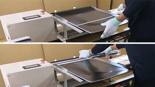タンザックカレンダー自動巻き取り・封入補助機